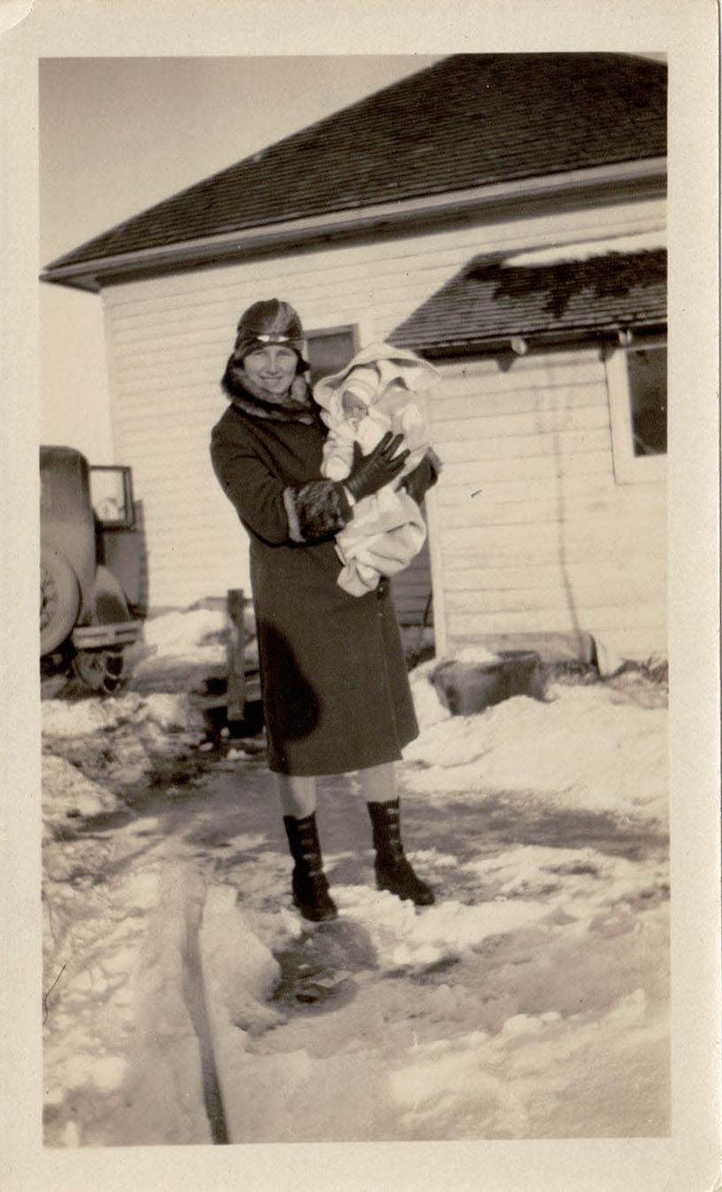 Mabel holding baby Adeline